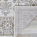 Couristan Charm Indoor/Outdoor Rug - Woodburn/Ivory-Sand is flipped to show the underside, illustrating its flat woven backing and subtle color consistency
