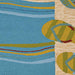 Couristan Covington Indoor/Outdoor Rug - Sandals/Sand-Multi showcases a section of ocean-like waves bordered by green and yellow flip-flops