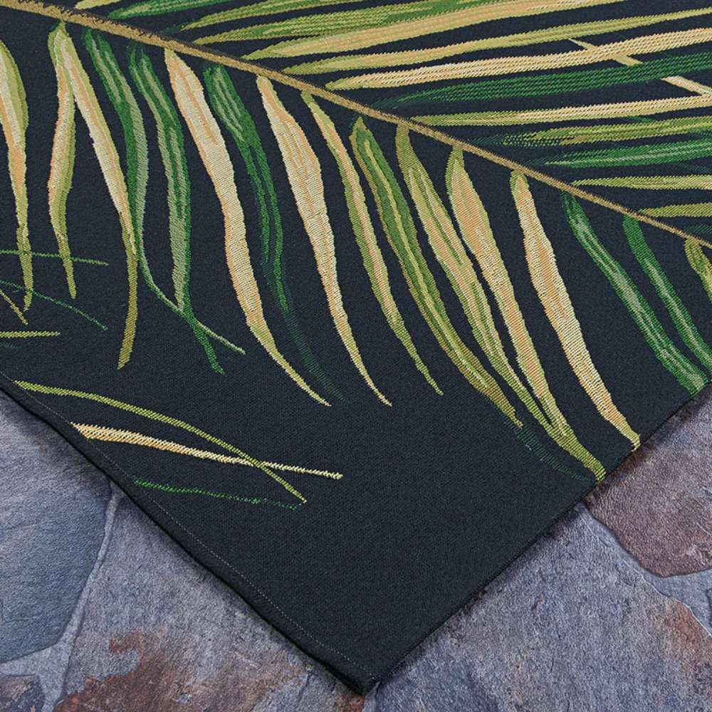 Couristan Dolce Indoor/Outdoor Rug - Bamboo Forest/Cool Onyx displays detailed tropical palm fronds in shades of green and yellow