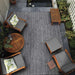 Couristan Dolce Indoor/Outdoor Rug - Majorelle/Silver-Black is placed under outdoor furniture