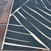 Couristan Dolce Indoor/Outdoor Rug - Parquet/Ink features sharp, angular ivory lines on an ink-blue background in a modern zigzag pattern
