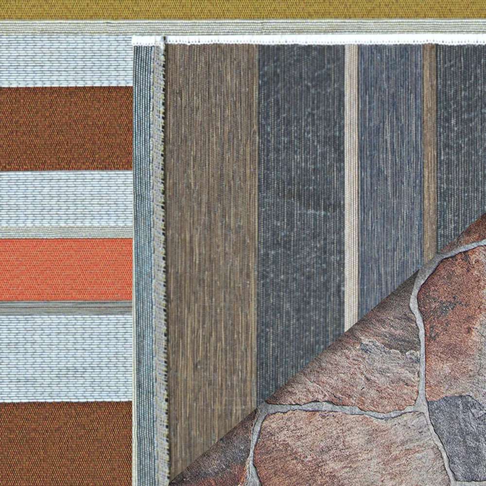 Couristan Dolce Indoor/Outdoor Rug - Striped/Sunset is shown partially flipped to reveal the contrasting darker stripe pattern on the reverse side