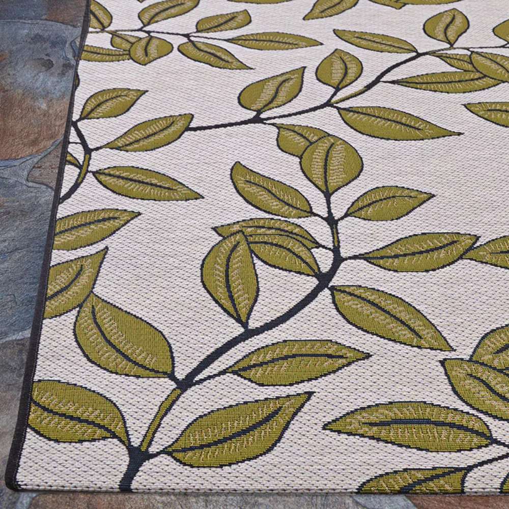 Couristan Dolce Indoor/Outdoor Rug - Summer Ivy/Ivory-Olive displays leafy vines in olive and khaki tones sprawling over a soft ivory background
