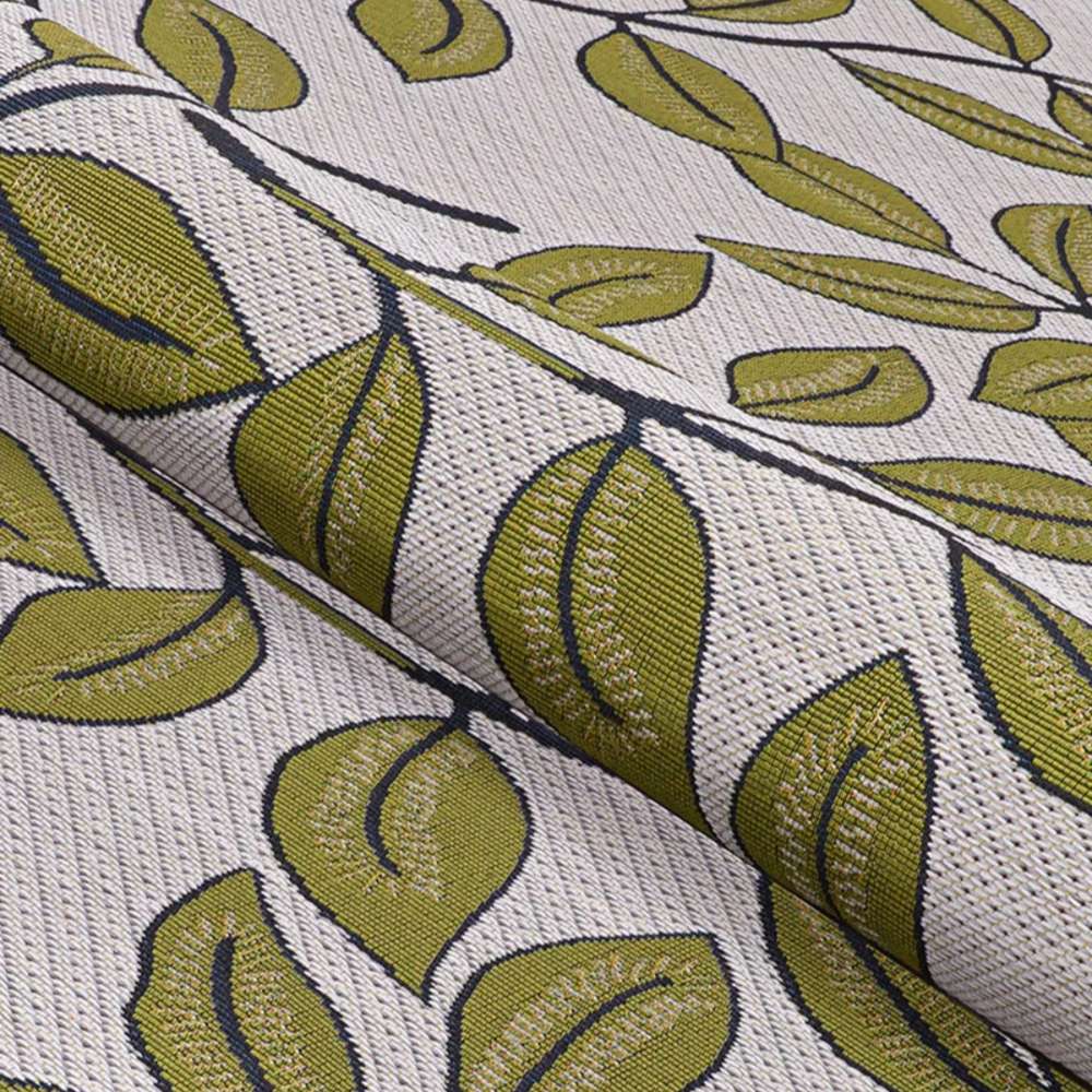 Couristan Dolce Indoor/Outdoor Rug - Summer Ivy/Ivory-Olive is partially folded