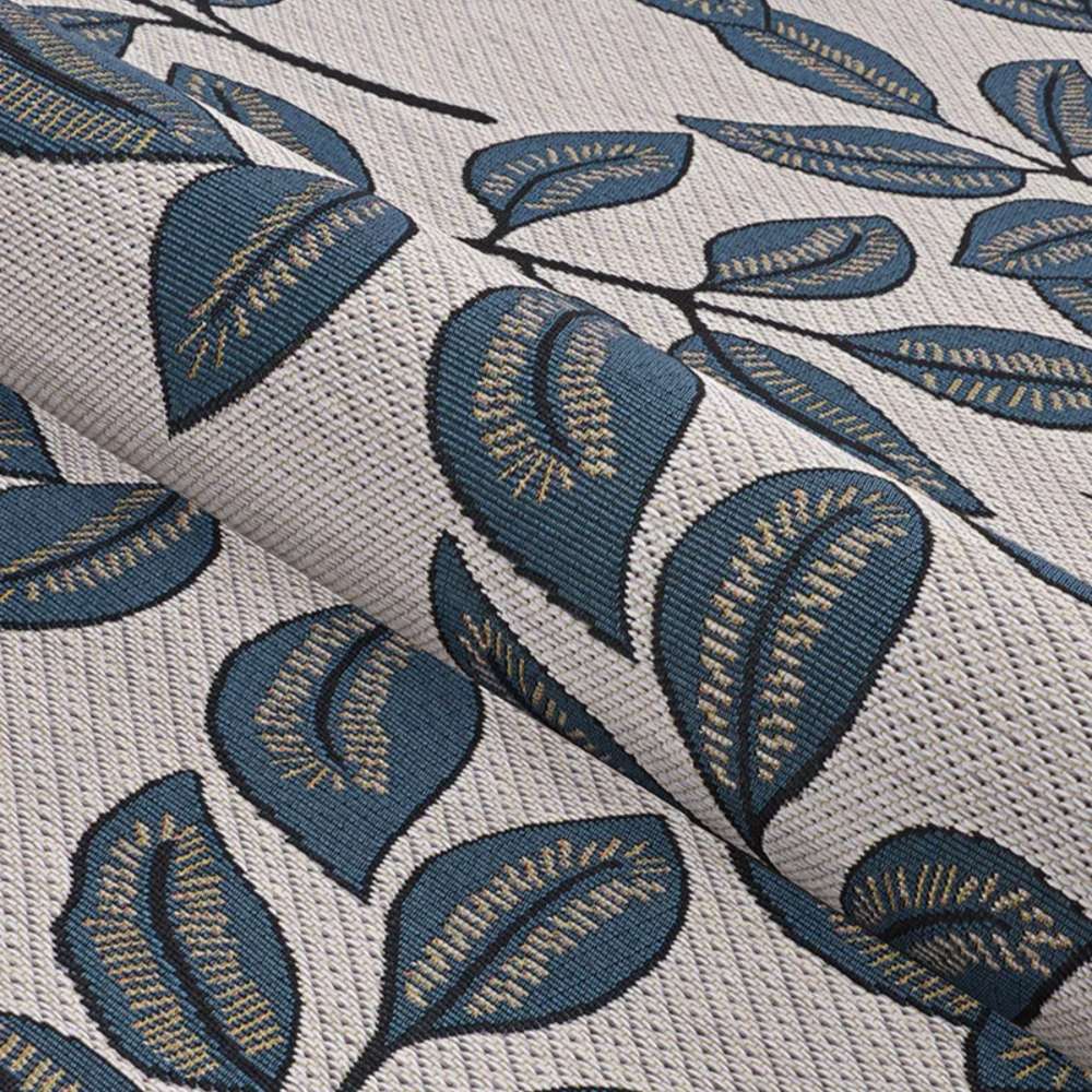 Couristan Dolce Indoor/Outdoor Rug - Summer Ivy/Ivory-Slate Blue is gently folded