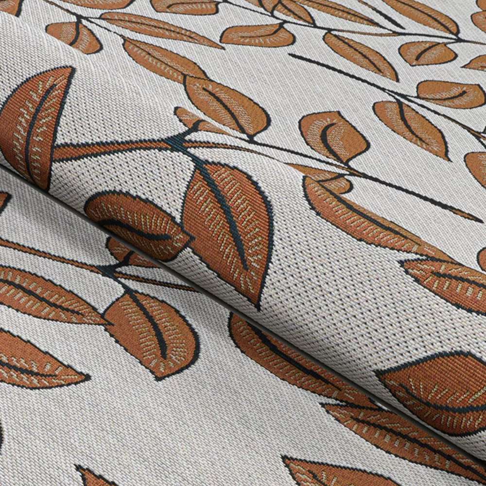 Couristan Dolce Indoor/Outdoor Rug - Summer Ivy/Ivory-Terra-Cotta is partially rolled
