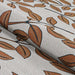 Couristan Dolce Indoor/Outdoor Rug - Summer Ivy/Ivory-Terra-Cotta is partially rolled