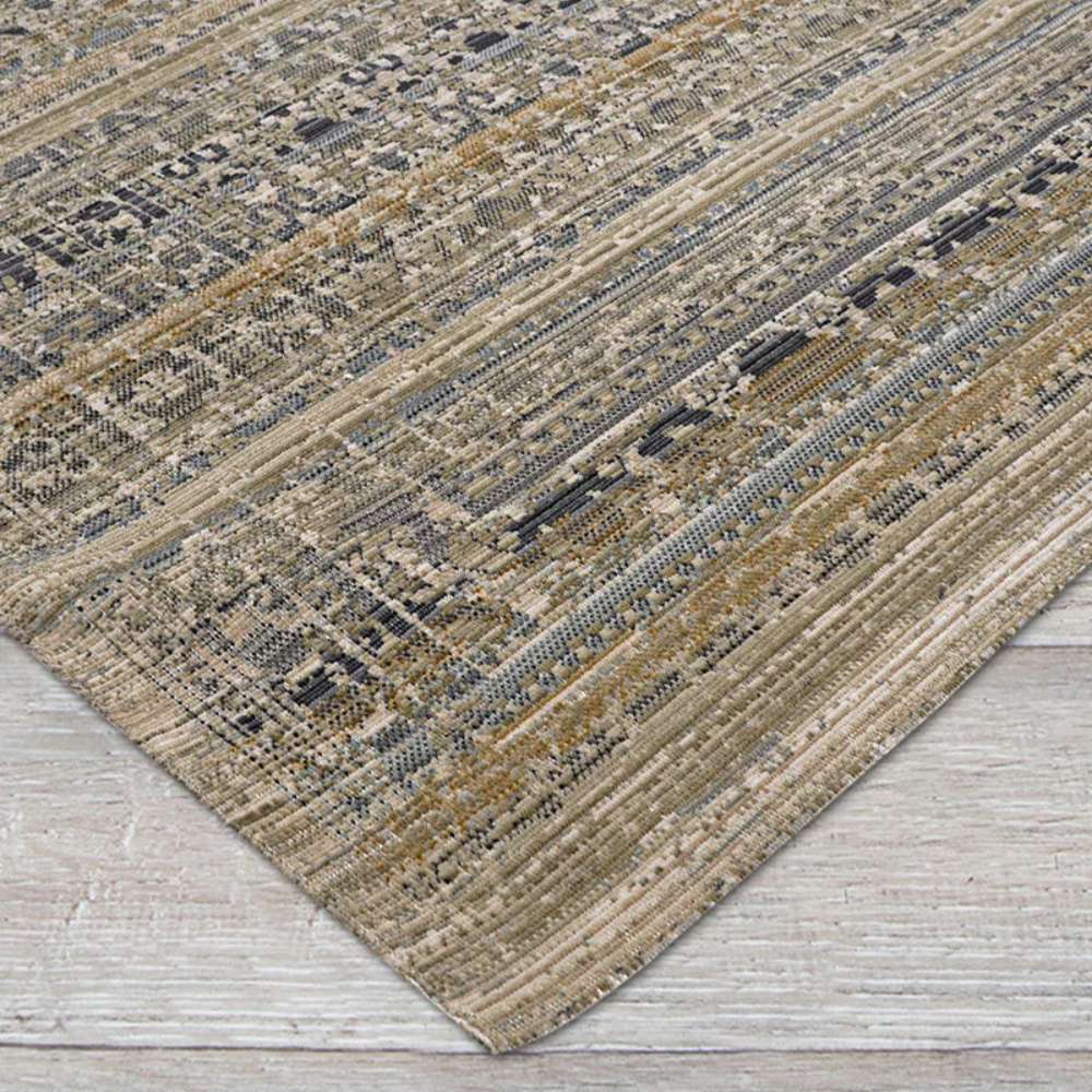 Couristan Fez Indoor/Outdoor Rug - Medina/Earthen is shown close-up displaying its tightly woven texture and earthy tones with subtle geometric patterns