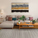 Couristan Fez Indoor/Outdoor Rug - Riad/Ash is styled in a modern living room under a beige sectional sofa and wooden coffee table