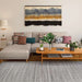 Couristan Fez Indoor/Outdoor Rug - Riad/Tobacco is displayed in a modern living room under a beige sectional sofa, wooden table, and decorative plants