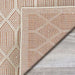 Couristan Liguria Indoor/Outdoor Rug - Rapallo/Umber shows its underside corner folded over revealing the same diamond pattern in reverse