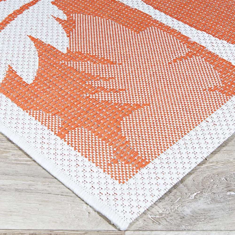 Couristan Monaco Indoor/Outdoor Rug - Coastal Flora/Ivory-Orange displays a detailed corner design