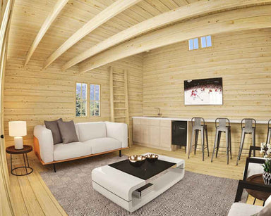 Cozy living area of Sawmill Structures The Northwood Grand SD 70mm Garden Room features a white sofa, kitchen bar with stools, and large windows for natural light