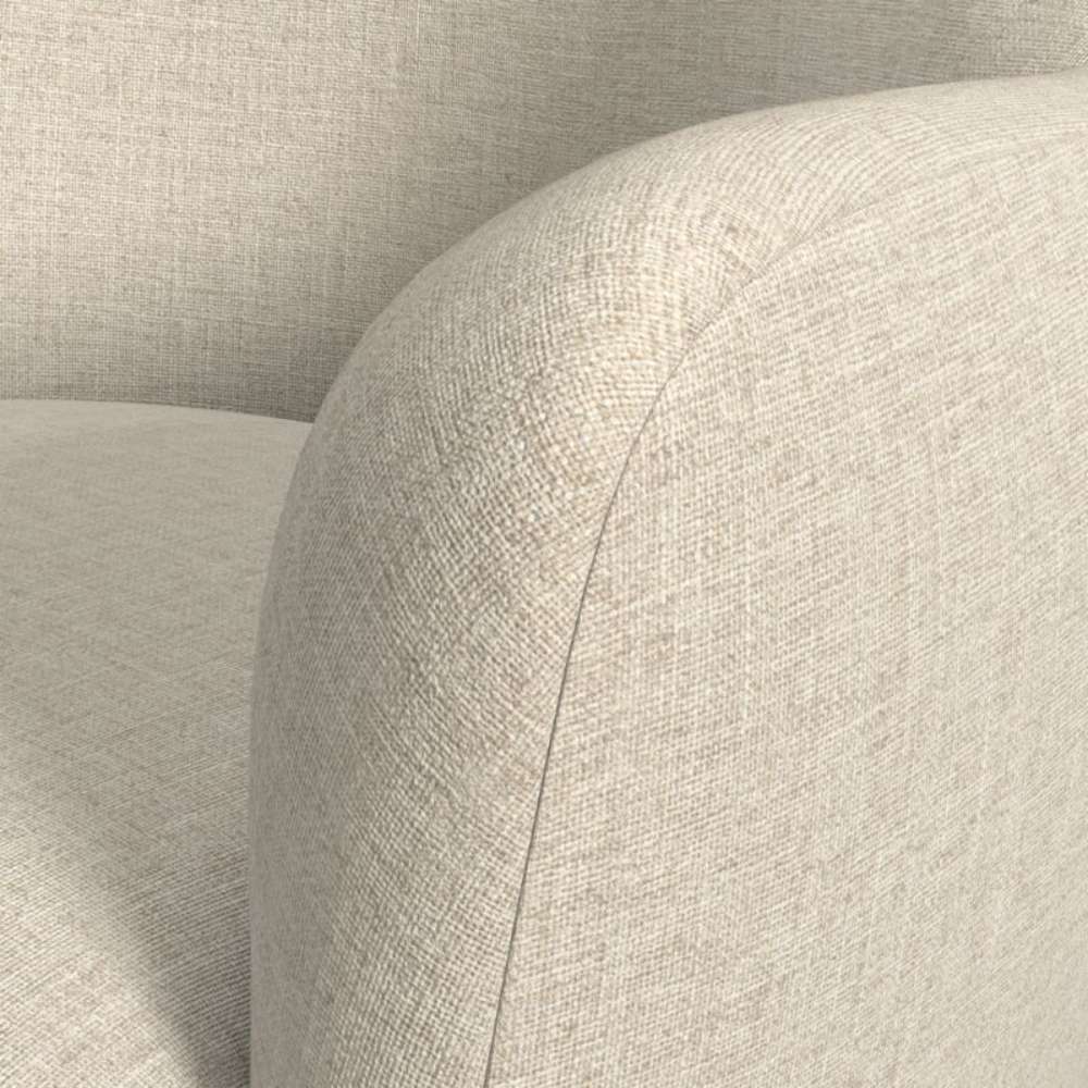 Crate & Barrel Bellevue Upholstered Office Chair close-up showing the beige woven upholstery texture and curved back seam