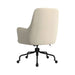 Crate & Barrel Bellevue Upholstered Office Chair shown from the back with a beige fabric seat, rounded backrest, black metal base, and small caster wheels