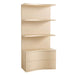 Crate & Barrel Coast 40" Whitewashed Oak Open Storage Bookcase shown from the front with three open shelves above two curved storage drawers