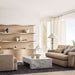 Crate & Barrel Coast 80" Whitewashed Oak Open Storage Bookcase, Set of 2 styled in a bright living room with decorative objects displayed across the wide open shelves