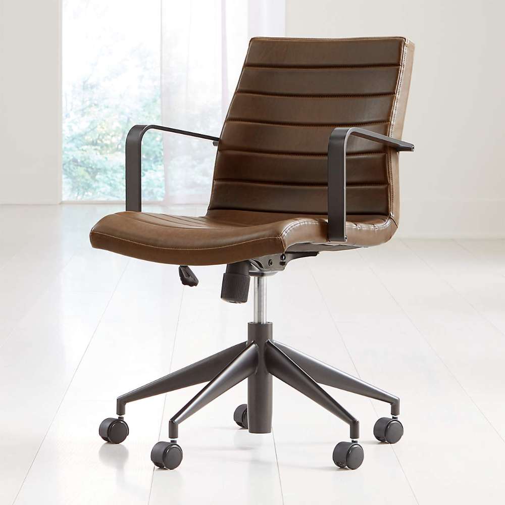 Crate & Barrel Graham Brown Office Chair displayed in a bright room with a swivel base and cushioned seat