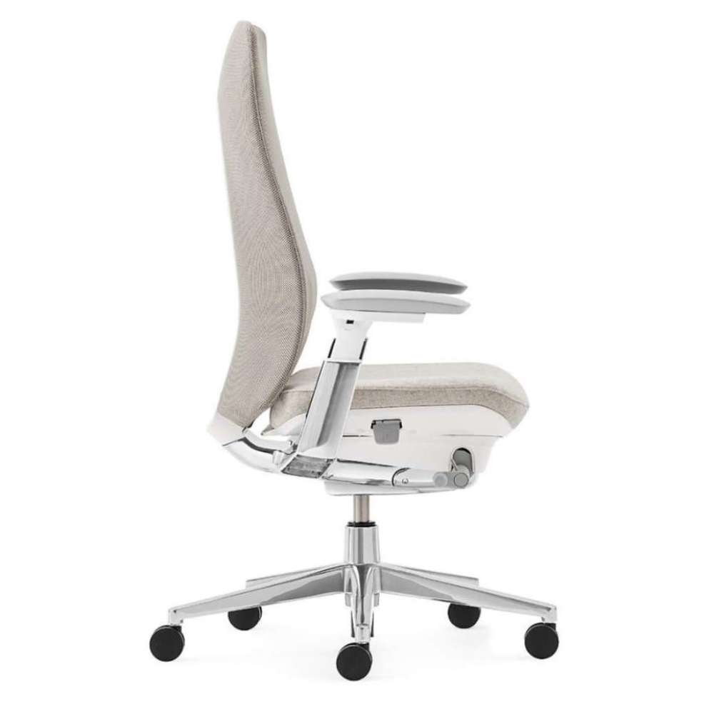 Crate & Barrel Haworth Fern Upholstered Beach Office Chair shown in side profile with a slim backrest, padded seat, adjustable armrests, and rolling base