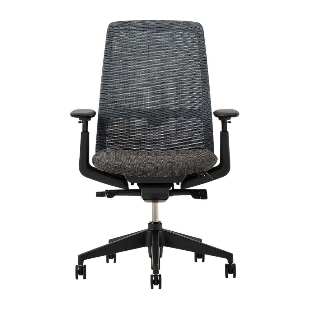 Crate & Barrel Haworth Soji Upholstered Charcoal and Mesh Office Chair front view highlights the breathable mesh back, upholstered seat, and adjustable armrests