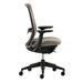 Crate & Barrel Haworth Soji Upholstered Clay and Mesh Office Chair side profile shows its slim ergonomic frame, cushioned seat, and adjustable armrests