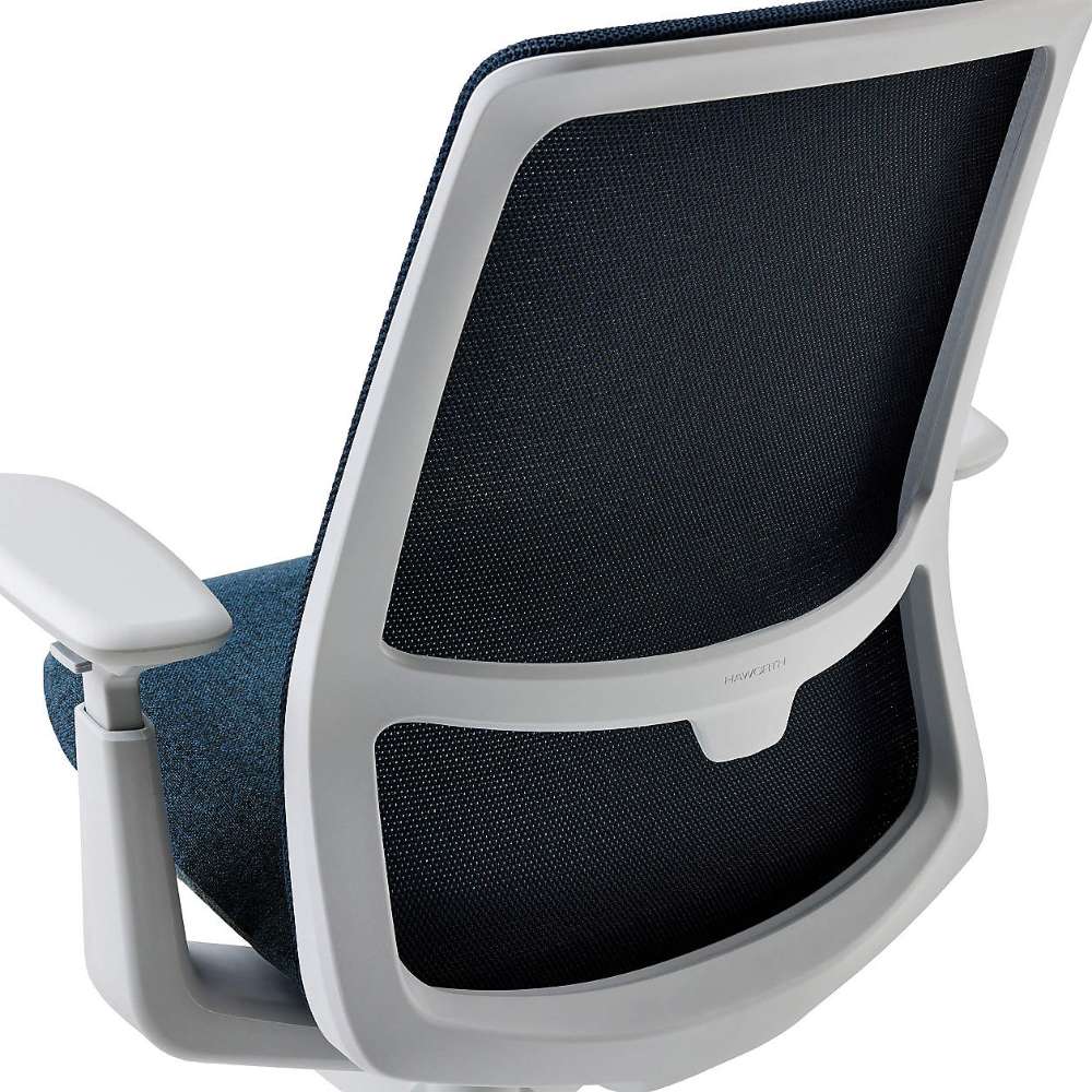 Crate & Barrel Haworth Soji Upholstered Navy and Mesh Office Chair rear view highlights the breathable mesh back and sturdy white frame