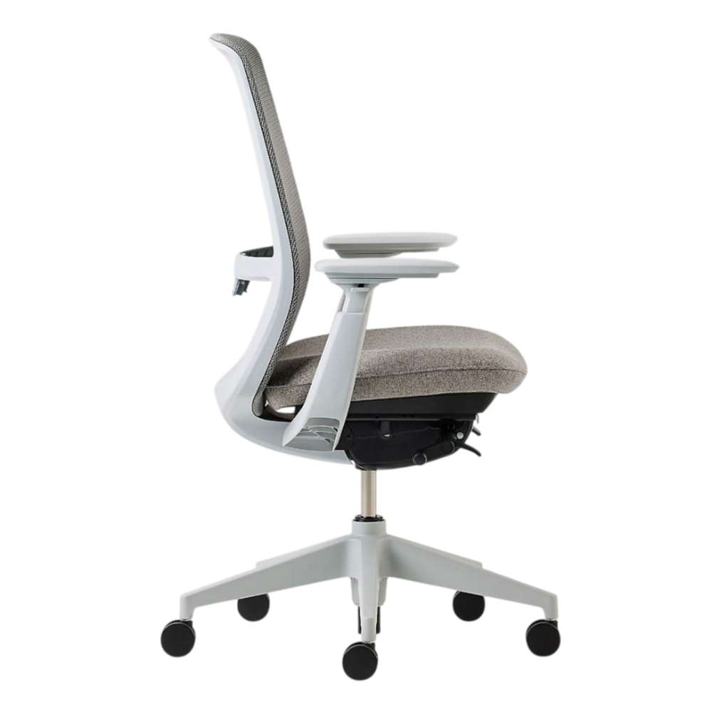 Crate & Barrel Haworth Soji Upholstered Stone and Mesh Office Chair side profile highlights its slim ergonomic frame, cushioned seat, and adjustable armrests