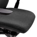 Crate & Barrel Haworth Zody Upholstered Charcoal Office Chair features a close-up of the cushioned seat with soft charcoal fabric upholstery