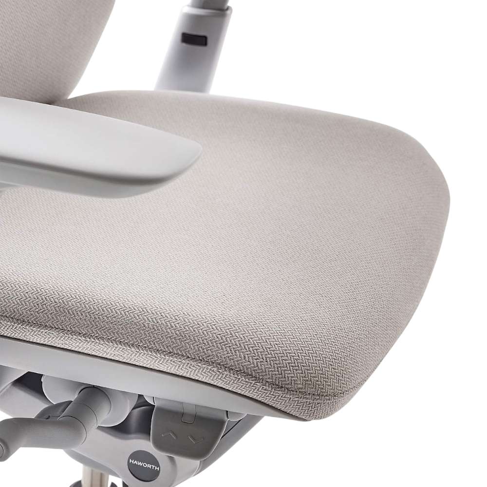 Crate & Barrel Haworth Zody Upholstered Fog Office Chair close-up of the cushioned fabric seat with a textured upholstery finish