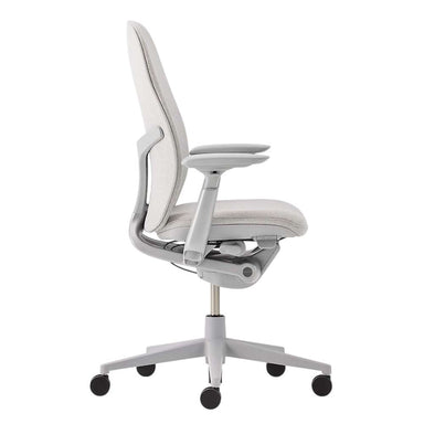 Crate & Barrel Haworth Zody Upholstered Fog Office Chair side profile showing the ergonomic design, padded seat, and adjustable armrests