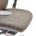Crate & Barrel Haworth Zody Upholstered Stone Office Chair features a close-up of the cushioned seat with durable textured fabric upholstery