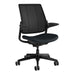 Crate & Barrel Humanscale® Smart Ocean Blue Wool Office Chair shown from the front at an angle with a breathable mesh back and cushioned blue wool seat