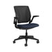 Crate & Barrel Humanscale® World LM Navy Seat Task Office Chair features a breathable black mesh back, navy upholstered seat, adjustable armrests, and a five-wheel base on a white background