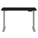 Crate & Barrel Humanscale® eFloat Go 2.0 48" Black Adjustable Standing Charging Desk with a black rectangular top and silver height-adjustable frame