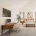 Crate & Barrel Jens Plush Ivory Office Chair placed at a wooden desk in a bright bedroom workspace with neutral décor