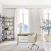 Crate & Barrel Jens Plush Ivory Office Chair styled in a modern home office beside a light wood desk and large windows