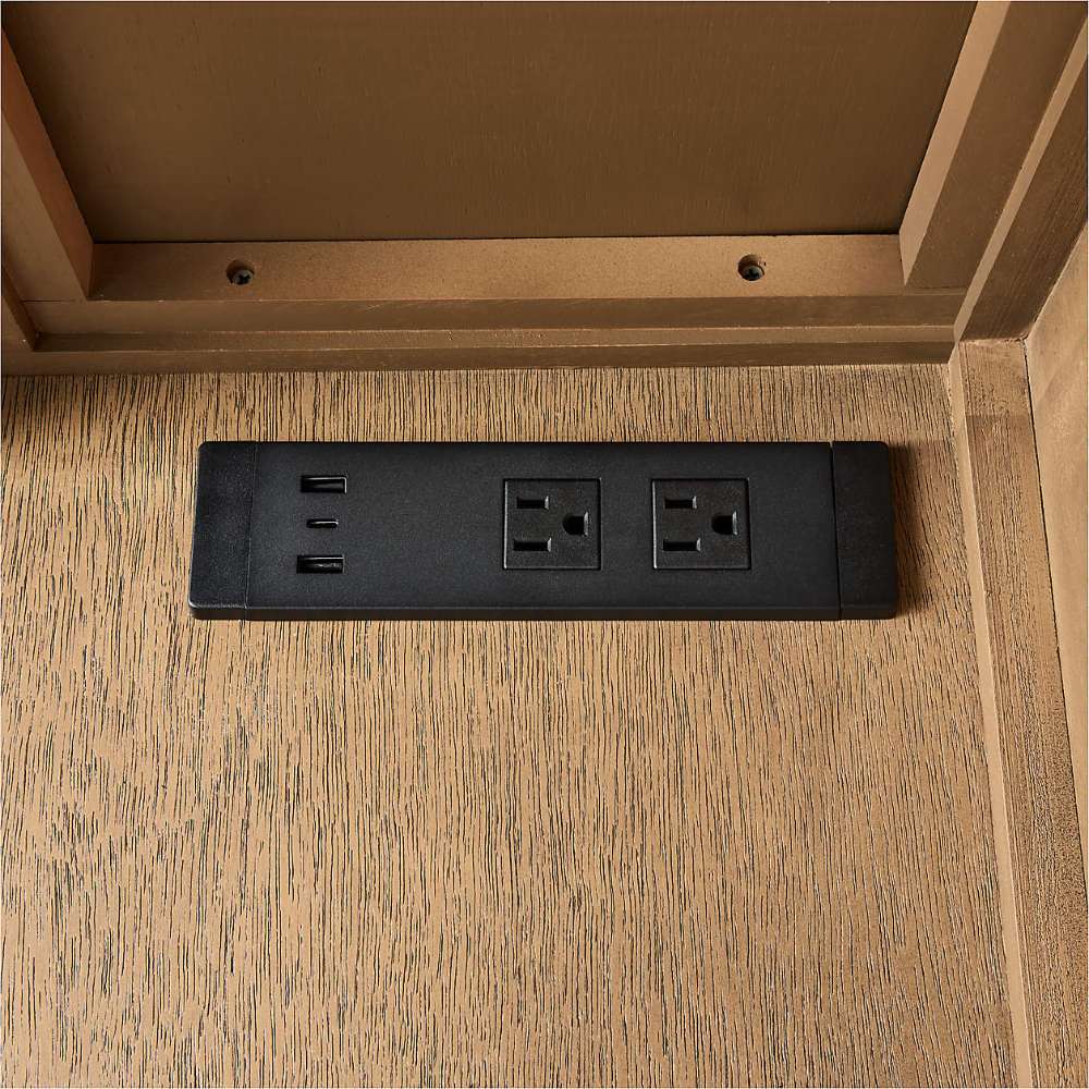 Crate & Barrel Keane 65" Solid Driftwood Desk with Outlets close-up of the built-in power outlets and USB charging ports