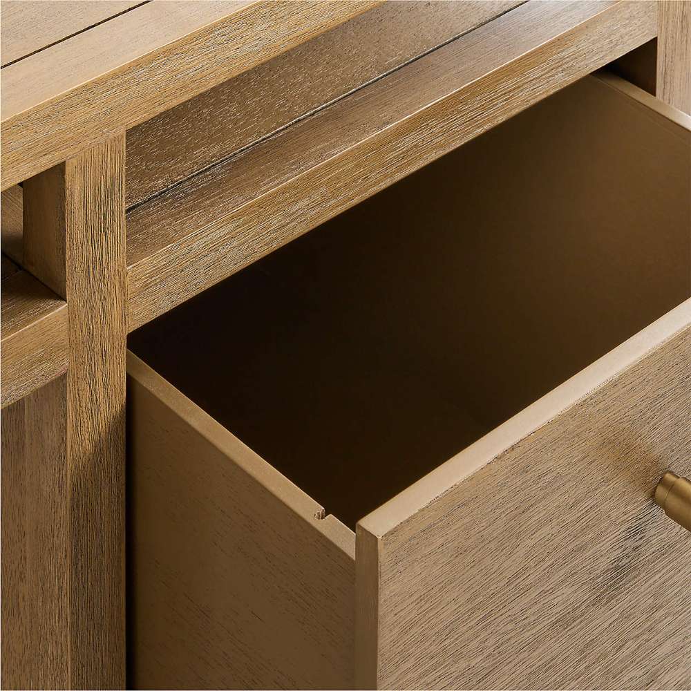 Crate & Barrel Keane 65" Solid Driftwood Desk with Outlets close-up of the file drawer opened to reveal spacious storage
