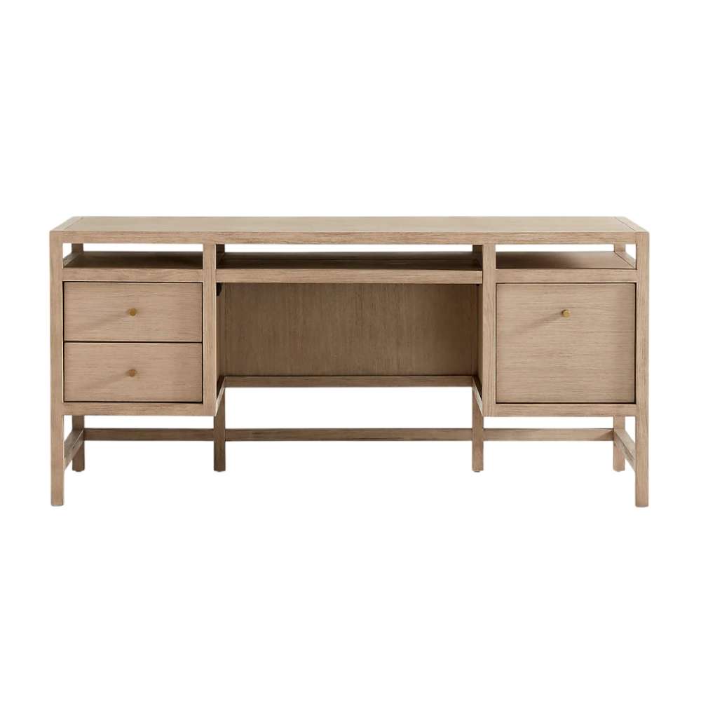 Crate & Barrel Keane 65" Weathered Natural Wood Desk with Outlets front view featuring two drawers, a file cabinet drawer, and center storage