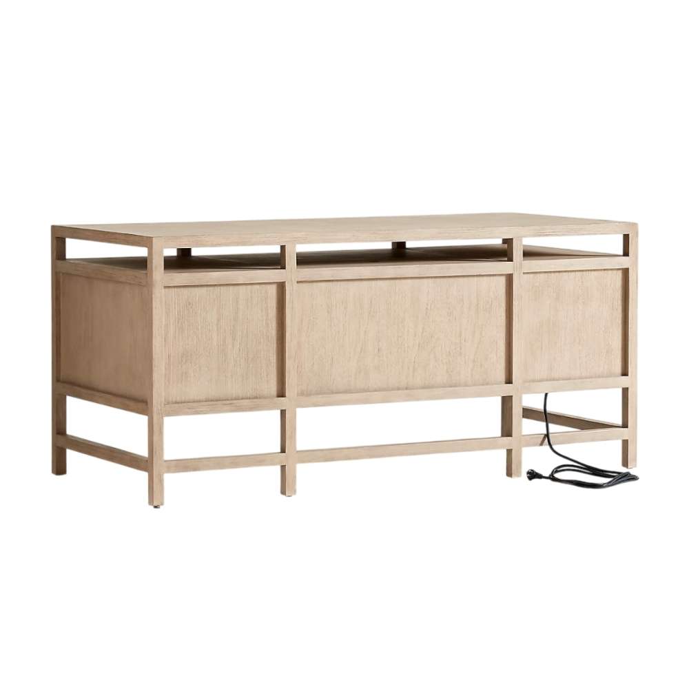 Crate & Barrel Keane 65" Weathered Natural Wood Desk with Outlets rear view showing the enclosed back panels and power cord access