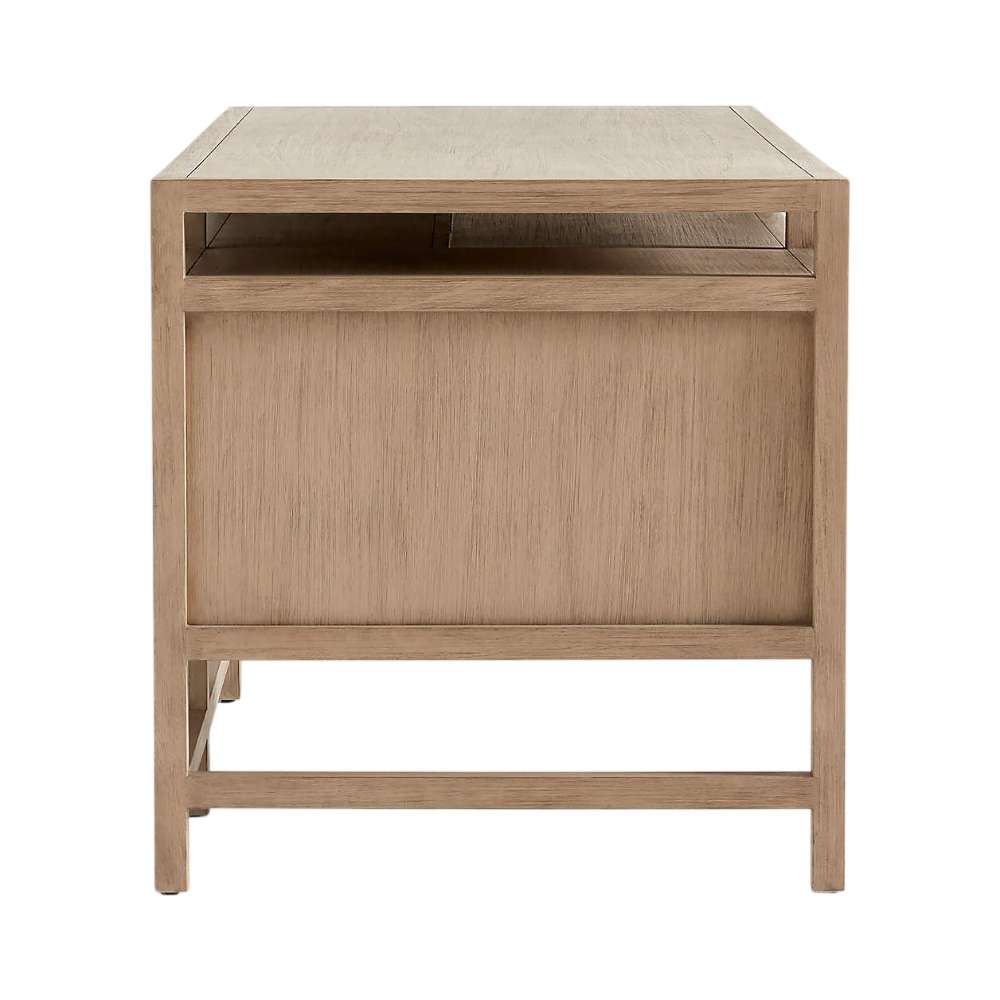 Crate & Barrel Keane 65" Weathered Natural Wood Desk with Outlets side view highlighting its sturdy frame and open storage shelf