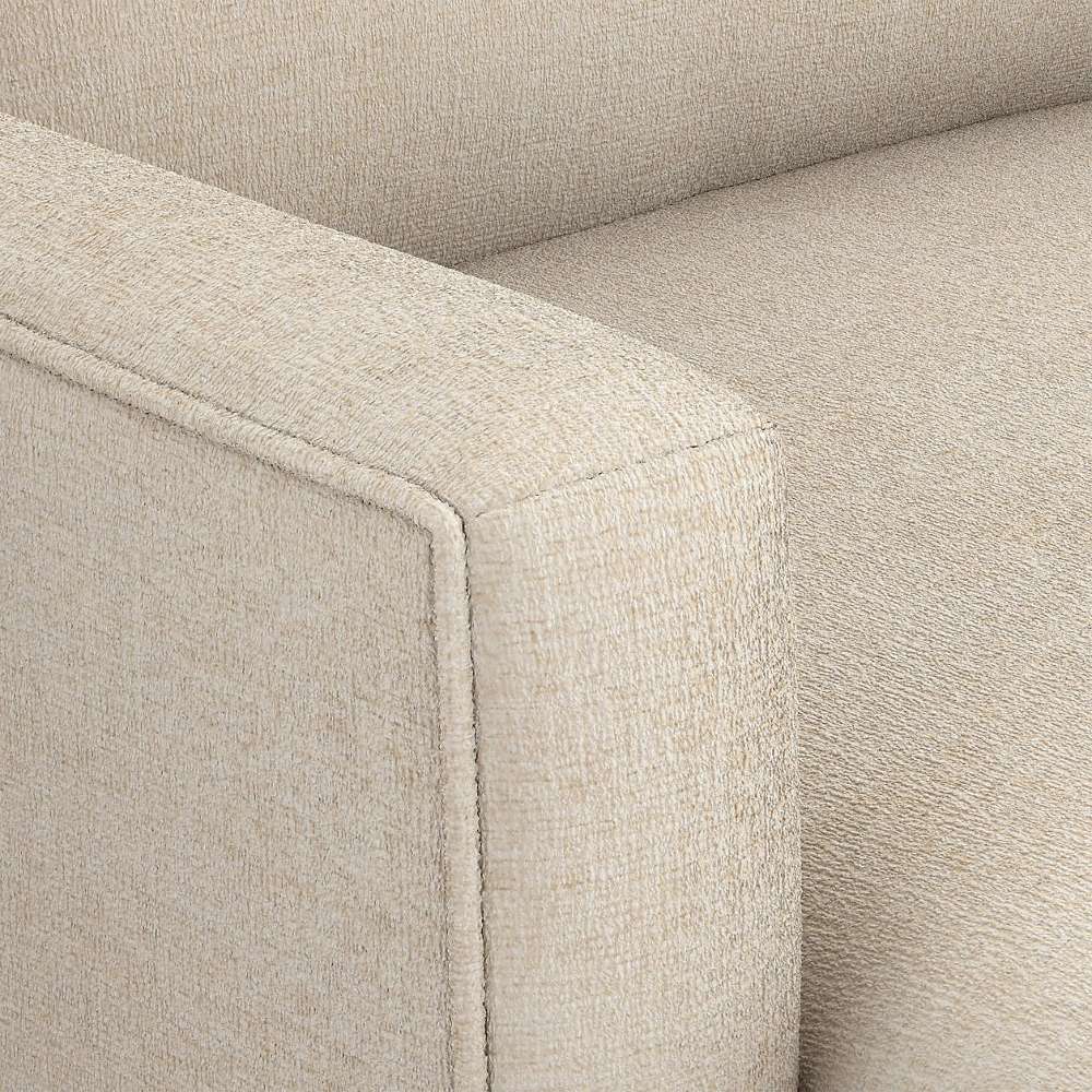 Crate & Barrel Lounge Sofa close-up showing the textured fabric upholstery and neatly tailored armrest detail