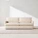 Crate & Barrel Lounge Sofa shown from the front with clean lines, slim track arms, and soft beige upholstery