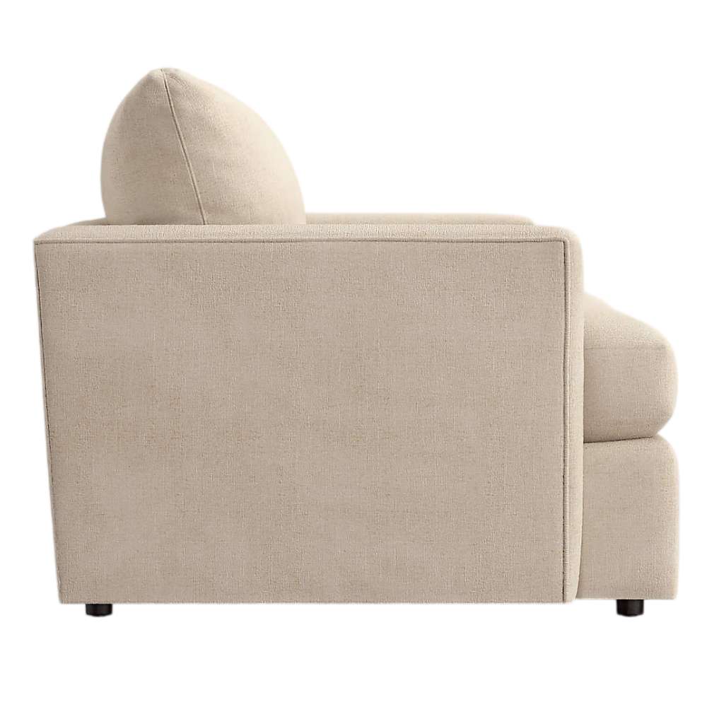 Crate & Barrel Lounge Sofa shown from the side, highlighting its wide armrest, thick cushions, and modern profile