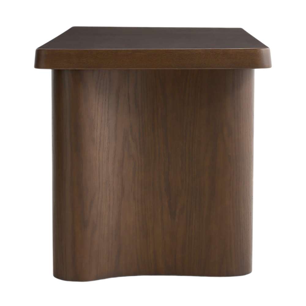 Crate & Barrel Ondule 64" Fumed Oak Brown Desk side view highlighting its sculptural curved panel base and thick desktop