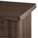 Crate & Barrel Ondule 64" Fumed Oak Brown Desk with a rounded fumed oak corner and smooth waterfall edge detail
