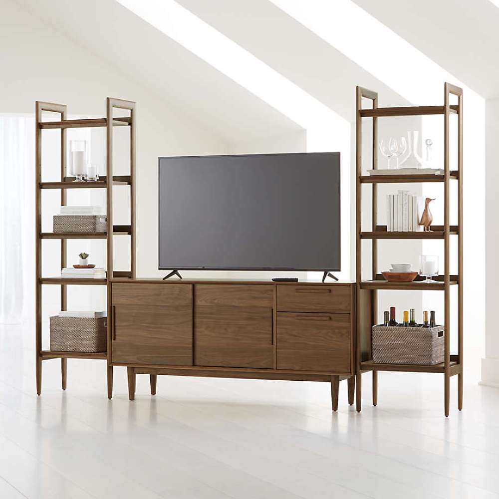 Crate & Barrel Tate 108.5" Walnut Storage Media Console and Bookshelf Set creates a complete entertainment wall with open shelving, storage cabinets, and a TV display