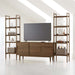 Crate & Barrel Tate 108.5" Walnut Storage Media Console and Bookshelf Set creates a complete entertainment wall with open shelving, storage cabinets, and a TV display
