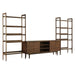 Crate & Barrel Tate 124" Walnut Storage Media Console and Bookshelf Set displayed with a TV and decorative items arranged across the shelves and console