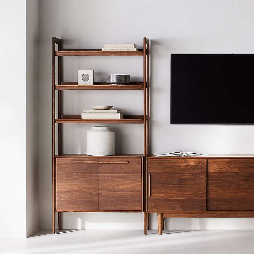 Crate & Barrel Tate 36" Walnut Wood 3-Shelf Storage Bookcase Cabinet placed beside a matching media console